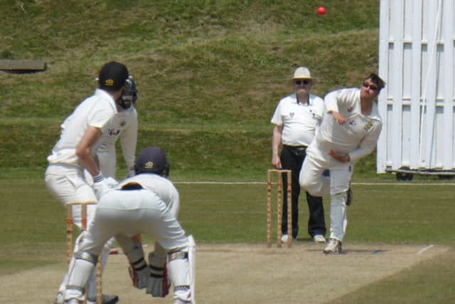 Priory spinner Jack Coleman tosses one up against Portslade.