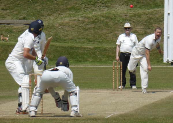 James Pooley bowling for Hastings Priory against Portslade. Pictures by Simon Newstead