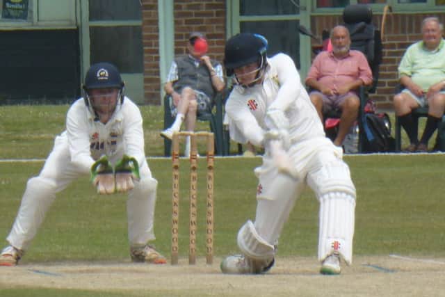 Greg Devlin goes on the attack during the latter part of Priory's innings.
