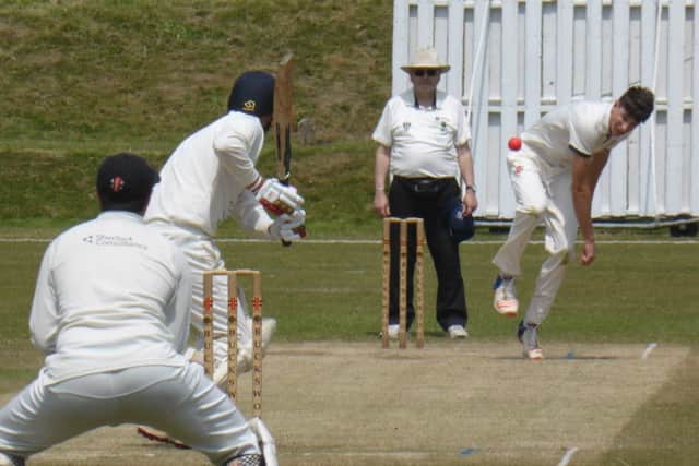 Adam Pye charges in during an impressive spell with the new ball.