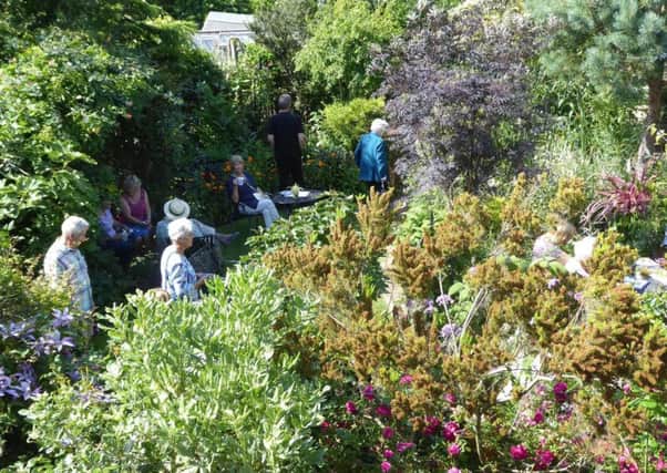 Visitors to Channel View last year following the brick paths radiating from the wildlife pond