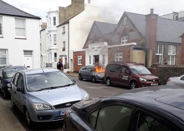 The car on fire in Portland Road. Photo: Eddie Mitchell