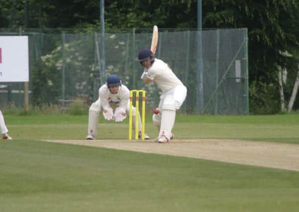 Craig Gallagher in action for Horsham CC. Photo by Clive Turner