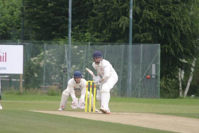 Rhys Beckwith in action for Horsham CC XI. Photo by Clive Turner