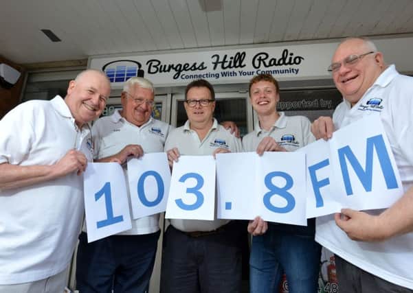 Members of Burgess Hill Radio celebrating outside its premises in Church Walk. Picture: Peter Cripps
