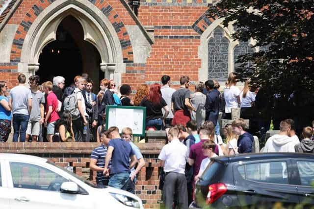 Crowds outside St John's Church in Burgess Hill. Picture: Eddie Mitchell