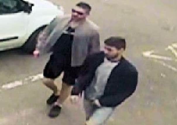 Police are seeking these two men in connection with a robbery