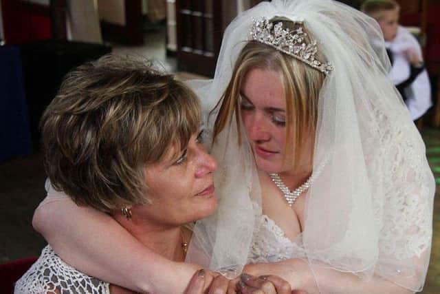 Samantha Chapman on her wedding day aged 21, with mum Mandy