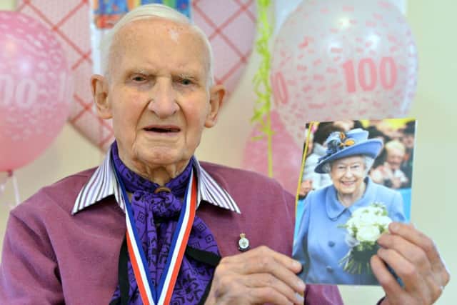 Congratulations from The Queen ... Tony Peakall in his purple neckerchief