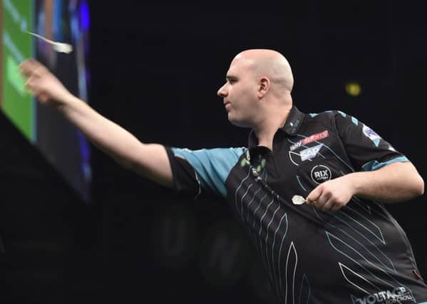 Rob Cross won Players Championship 13 in Wigan yesterday. Picture courtesy Michael Cooper/PDC