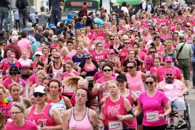 A sea of pink on the seafront for Worthing Race for Life 2018. Picture: Derek Martin DM1864278a