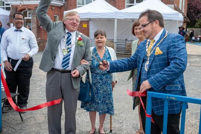 Councillor Alan Gammon, Chairman of Arun District Council, cheers as the Mayor of Littlehampton, Councillor Billy Blanchard-Cooper, cuts a ribbon and officially opens the Sussex Day event. Picture: Scott Ramsey