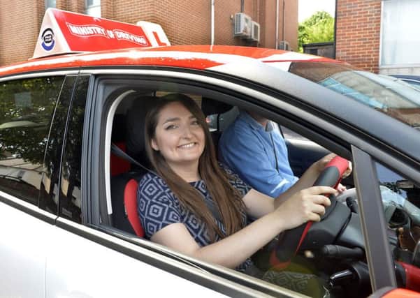 Ginny Sanderson and Driving Instructor Colin Goodsell in Eastbourne (Photo by Jon Rigby) SUS-180523-102204008