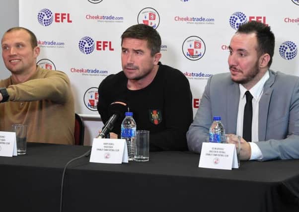 New Crawley Town head coach Harry Kewell, middle, with assistant Warren Feeney, left and director of football Selim Gayusuz, right, speaking to the press at the Checkatrade Stadium last night.
Picture by Phil Westlake (PW Sporting Photography)