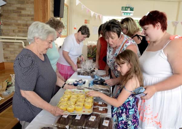 ks180298-4 St Wilfrids Fete  phot kate
Lots of delicious cakes on the cake stall..ks180298-4 SUS-180623-182225008