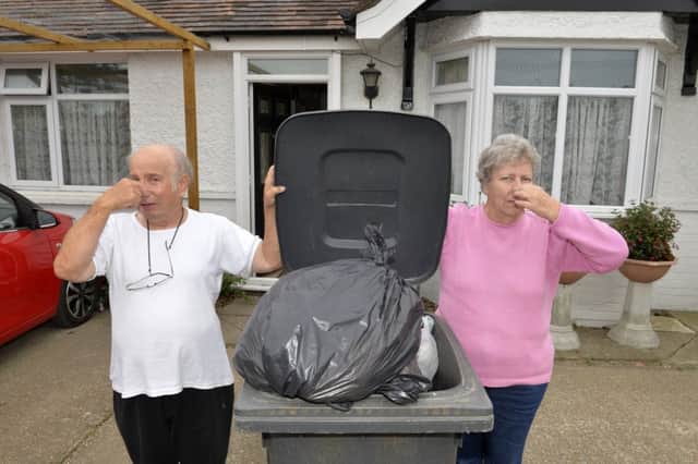 Allan (74) and Edna Gardner (72) next to their refuse bin outside their house in Polegate (Photo by Jon Rigby)