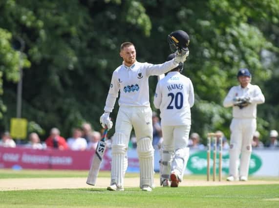 Phil Salt celebrates reaching his maiden first-class century at Arundel Castle. Picture by Phil Westlake