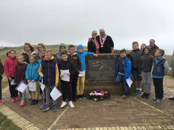 French schoolchildren and the mayors of Eastbourne and Fort Mahon Plage at the service at Beachy Head