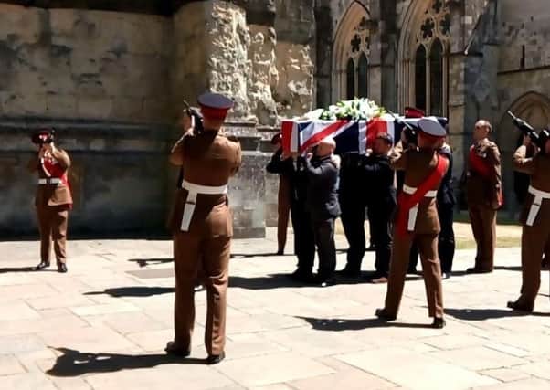 The gun salute at Danny Johnston's funeral