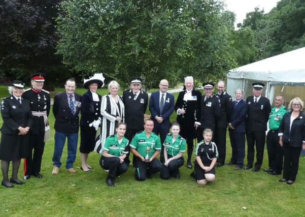 Front Row, left to right: Izzy Saunders, Cadet of the Year for West Sussex, Carl Bennett, winner of District Managers Award, Lauren Robinson, Lord Lieutenants Cadet for East Sussex, Jessica Redgrave, Badger of the Year.
Back Row, left to right: Caroline Lucas County President St John Ambulance Sussex, Peter Field - Lord Lieutenant of East Sussex, Dr James Walsh The Hospitaller, The Most Venerable Order of the Hospital of St John, Caroline Nicholls High Sheriff of West Sussex, Denise Patterson Deputy Lieutenant of West Sussex, John Wright long-serving St John Ambulance volunteer, Dan May-Jones Chairman CPG, John Moore-Bick High Sheriff of East Sussex, Trevor Moss District Manager, South District, Martin Houghton-Brown Chief Executive St John Ambulance and The Priory of England and the Islands, Mark Farmer Director of First Aid Operations St John Ambulance, Alex Ingham-Clark County Vice President West Sussex, Unal Salih Volunteer at Chichester Unit, Vanessa Gebbie County Vice President East Sussex
