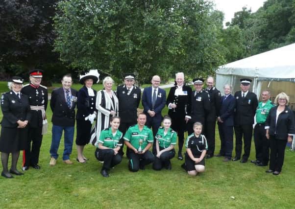 Front Row, left to right: Izzy Saunders, Cadet of the Year for West Sussex, Carl Bennett, winner of District Managers Award, Lauren Robinson, Lord Lieutenants Cadet for East Sussex, Jessica Redgrave, Badger of the Year.
Back Row, left to right: Caroline Lucas County President St John Ambulance Sussex, Peter Field - Lord Lieutenant of East Sussex, Dr James Walsh The Hospitaller, The Most Venerable Order of the Hospital of St John, Caroline Nicholls High Sheriff of West Sussex, Denise Patterson Deputy Lieutenant of West Sussex, John Wright long-serving St John Ambulance volunteer, Dan May-Jones Chairman CPG, John Moore-Bick High Sheriff of East Sussex, Trevor Moss District Manager, South District, Martin Houghton-Brown Chief Executive St John Ambulance and The Priory of England and the Islands, Mark Farmer Director of First Aid Operations St John Ambulance, Alex Ingham-Clark County Vice President West Sussex, Unal Salih Volunteer at Chichester Unit, Vanessa Gebbie County Vice President East Sussex