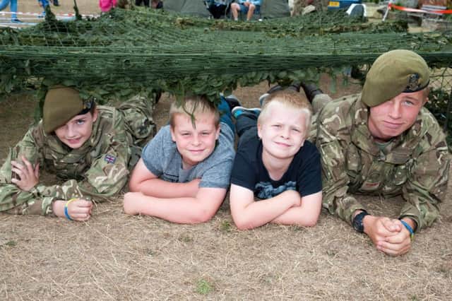 Last year's Littlehampton Armed Forces Day. In Photo: The Littlehampton Army Cadets stand (Left to Right) William, age 14, Ryan, age 11, George, age 8, and Josh ,age 16.
