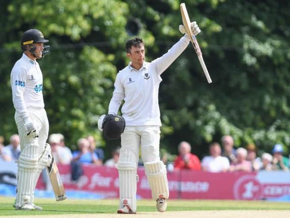 Tom Haines celebrates reaching his maiden Sussex century at Arundel Castle. Picture by Phil Westlake (PW Sporting Photography)