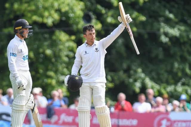 Tom Haines celebrates reaching his maiden Sussex century at Arundel Castle. Picture by Phil Westlake (PW Sporting Photography)