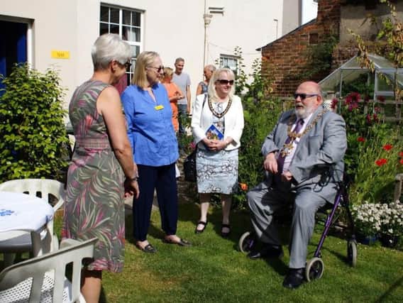 Paul and Sandra Baker, mayor and mayoress of Worthing, officially opened Ambrose Place back gardens. Picture by Mark Potter