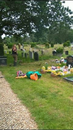 Anita Paige strims her family's graves and surrounding sites SUS-180207-172101001