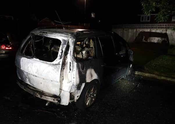 A car was targeted by arsonists in Crawley
