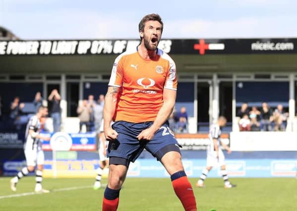 Ollie Palmer celebrates his equaliser for Luton this afternoon
