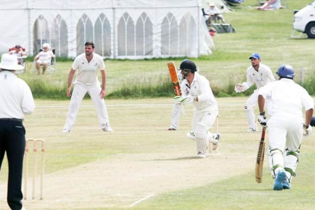 Action from Findon's derby clash with Goring. Picture by Derek Martin