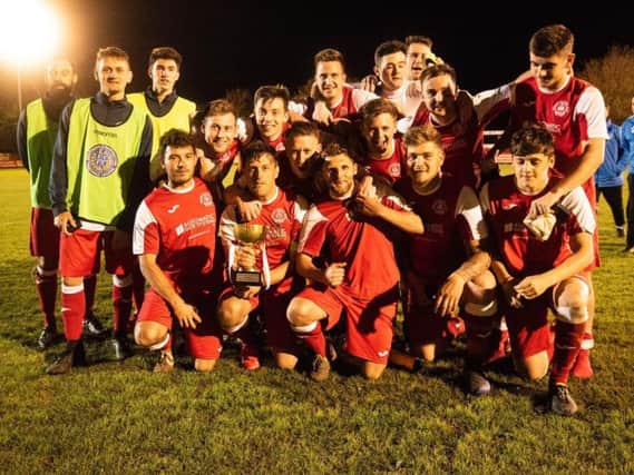 Bosham celebrate their Division 2 Cup win / Picture by Tommy McMillan