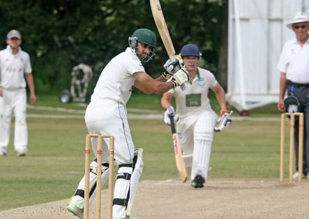 DM1865079a.jpg Cricket: Sussex League Division 2 Ansty (fielding) v Three Bridges. Walid Ghauri, left and Ollie Blandford. Photo by Derek Martin Photography. SUS-180624-001055008