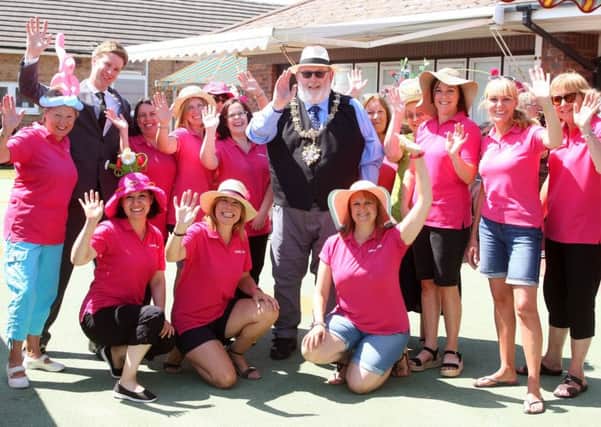 Worthing mayor Paul Baker with the team at Kamelia Kids. Picture: Derek Martin DM1866813a