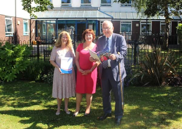 Sir Peter Bottomley with senior trust and foundations officer Ann Barlow and chief executive Suzanne Millard
