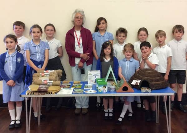 Phillipa Arnott of the Chichester Natural History Society with members of Funtington Primary Schools Eco Council