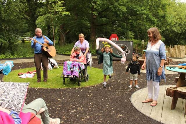 Fun and games with Superworm in the Woodland Walk at the hospice