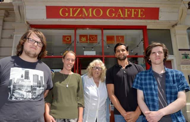 Prince's Trust making a donation to Gizmo.

L-R Stephen Debley, Jess Beerling (Asst Team Leader), Pat Fisher (Gizmo), Faizal Nanji (Team Leader) and Joseph Fenwick. SUS-180623-131614001