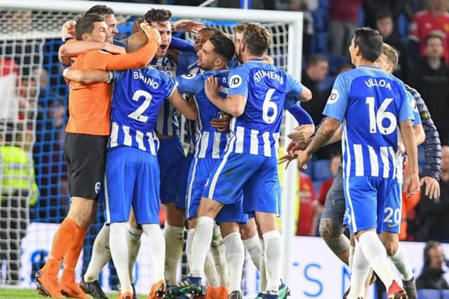 Brighton celebrate beating Manchester United in their final home game of last season. Picture by Phil Westlake (PW Sporting Photography)