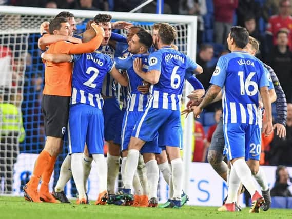 Brighton celebrate beating Manchester United in their final home game of last season. Picture by Phil Westlake (PW Sporting Photography)