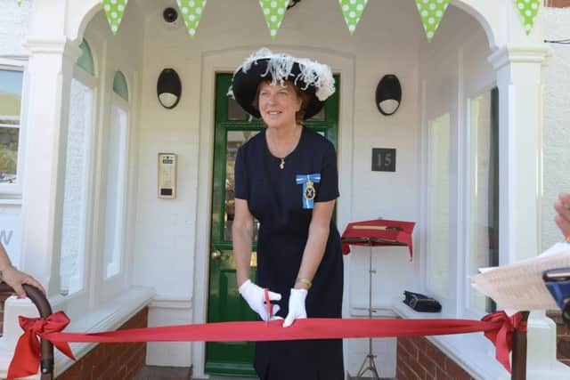 Caroline Nicholls, the High Sheriff, cut the ribbon to open the hostel