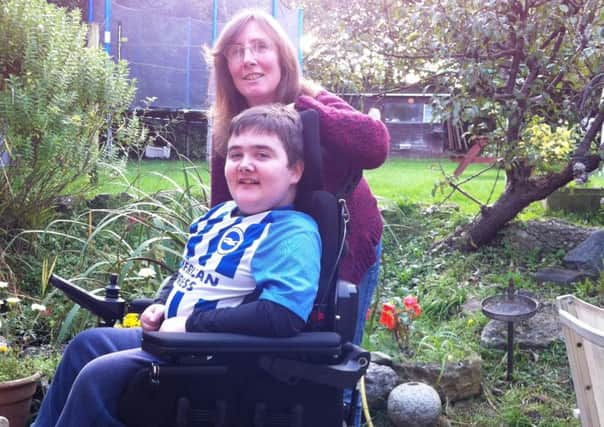 Penny Southall with son Daniel Hanson in his new wheelchair