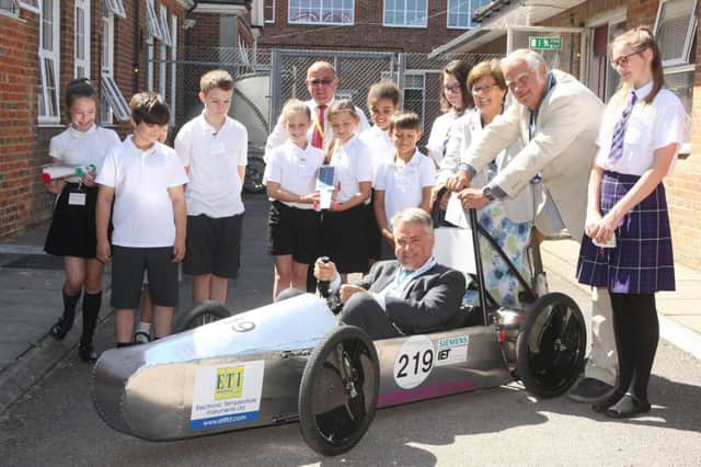 Tim Loughton MP joins the Solar Racer Workshop. Photo by Derek Martin Photography.