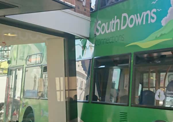 The bus collided with the shop front of Russell and Bromley PICTURE: Andrew Bracegirdle