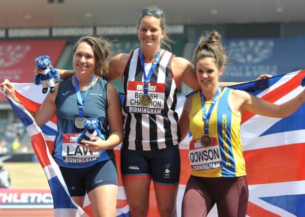 Jade Lally, middle, on the winner's podium with 2nd placed Kirsty Law, left, and 3rd placed Phoebe Dowson, right, at the British Championships at the Alexander Stadium in Birmingham. Picture courtesy of B&O PRESS PHOTO SUS-180207-104501002