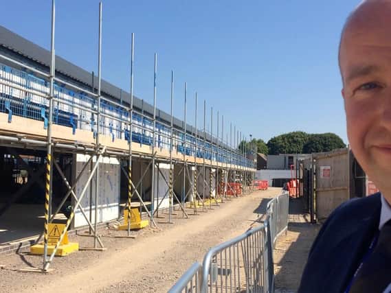 Headteacher of The Academy, Selsey, Tom Garfield at the building site.