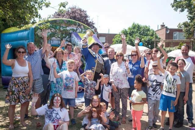 Worthing deputy mayor Hazel Thorpe and town crier Bob Smytherman join Reaching Families for its tenth anniversary celebrations u8Y0vDgSjwAd5oLC2klZ