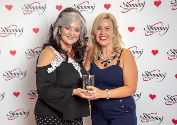 Natasha, right, received a gold award for her contribution to the Parkside Littlehampton Slimming World group